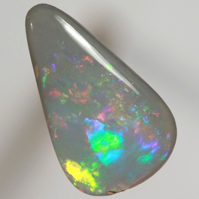 SOLID SEMI BLACK OPAL Sparkles of bright crisp red and green